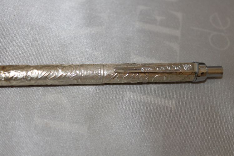 Waterman gold-plated ballpoint pens in box and Globus Judaica silver pen, 20th c.
