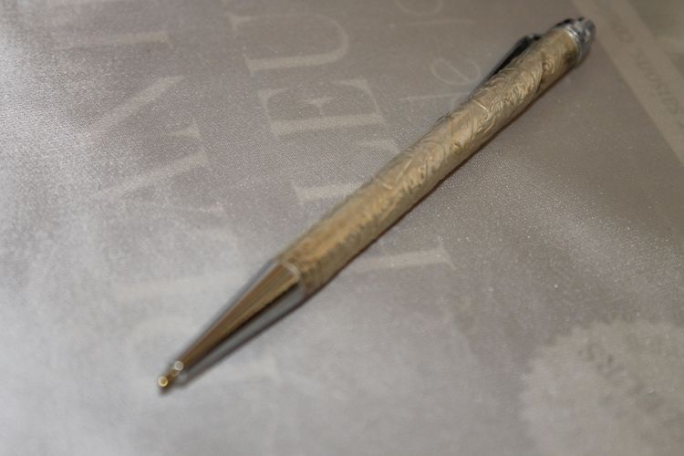 Waterman gold-plated ballpoint pens in box and Globus Judaica silver pen, 20th c.