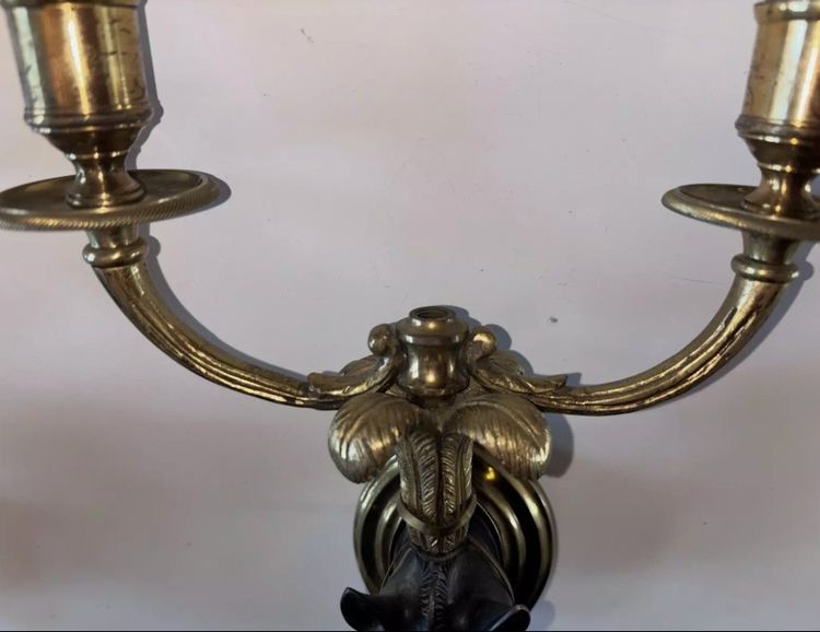 Maison BAGUES, Pair of Gilded Bronze And Black Patina Horse Wall Lights