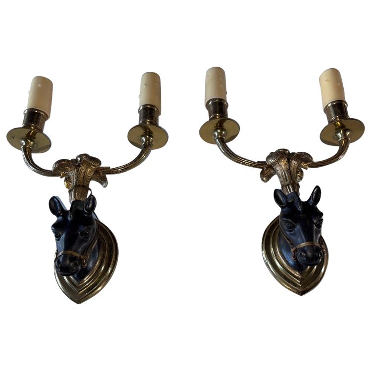 Maison BAGUES, Pair of Gilded Bronze And Black Patina Horse Wall Lights