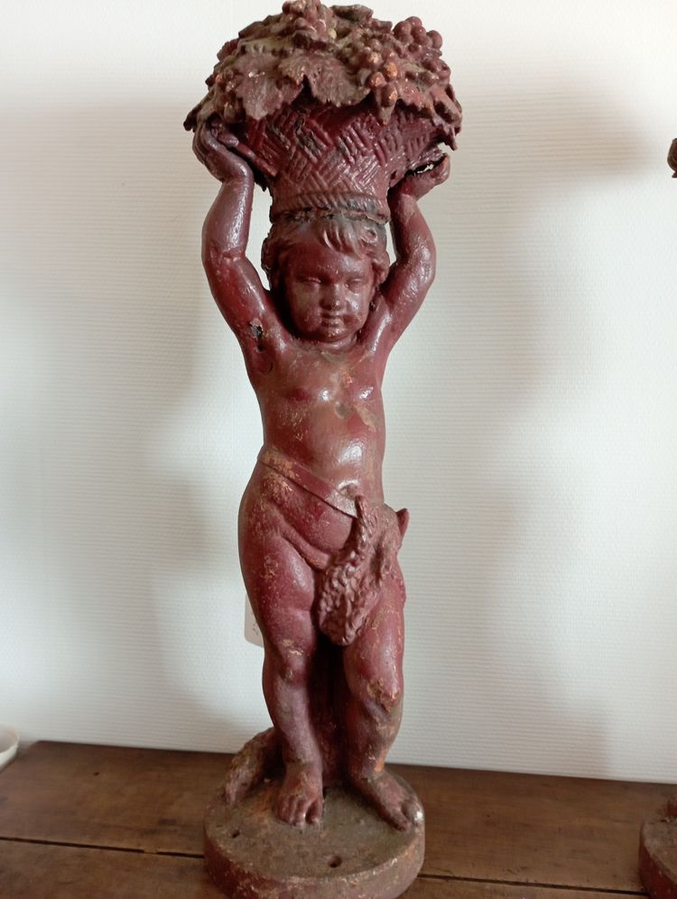coppia di putti in ghisa di Durenne