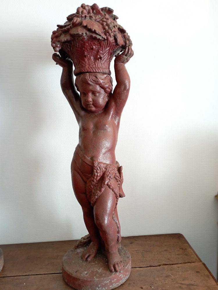 coppia di putti in ghisa di Durenne