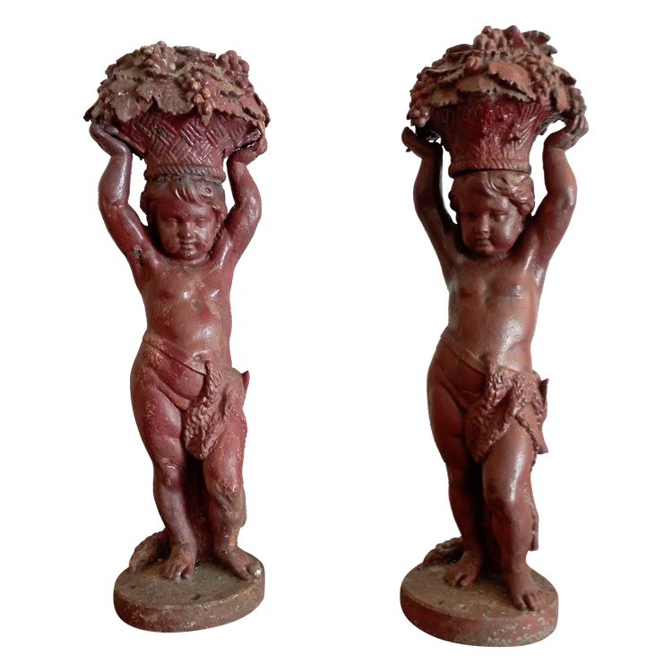 coppia di putti in ghisa di Durenne