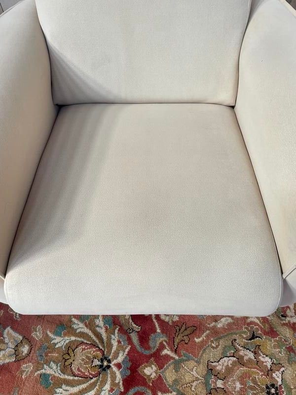 Pair of contemporary armchairs in beige suede