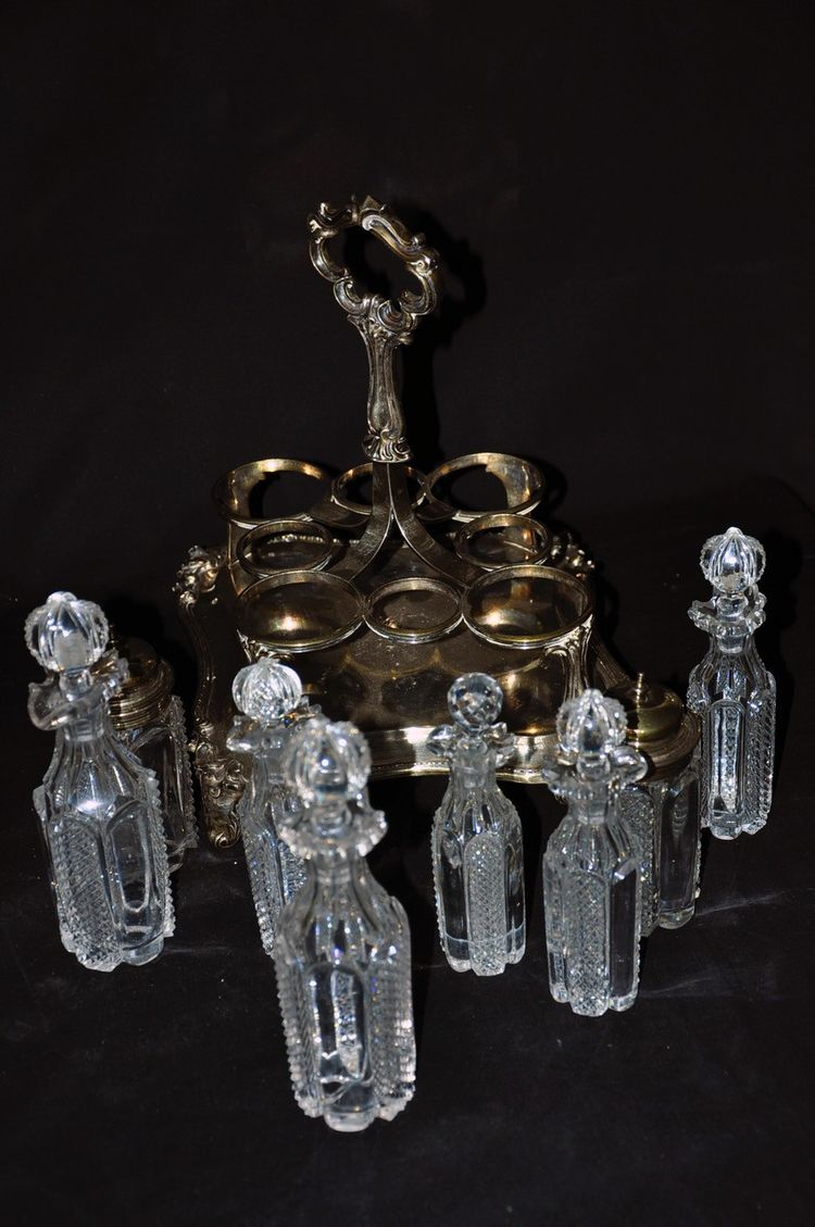 Crystal condiment set with silver frame