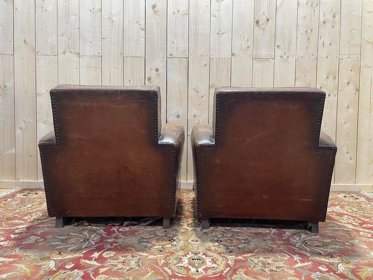 Paire de fauteuils Club en cuir usés 