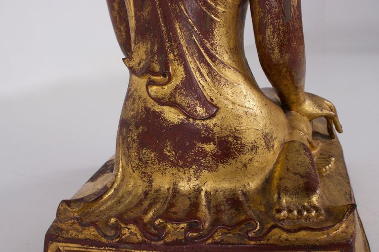 Burmese adoring monk in gilt bronze
