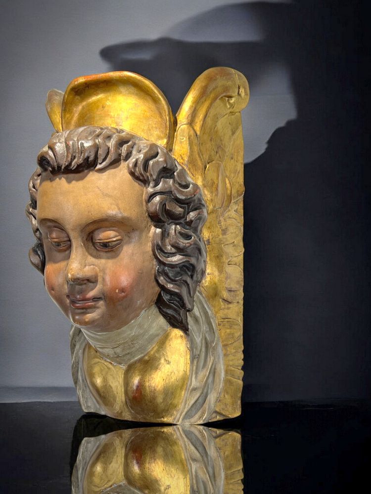 CONSOLE DA PARETE DEL XVII SECOLO CHE RAPPRESENTA UNA TESTA D'ANGELO IN LEGNO POLICROMATO