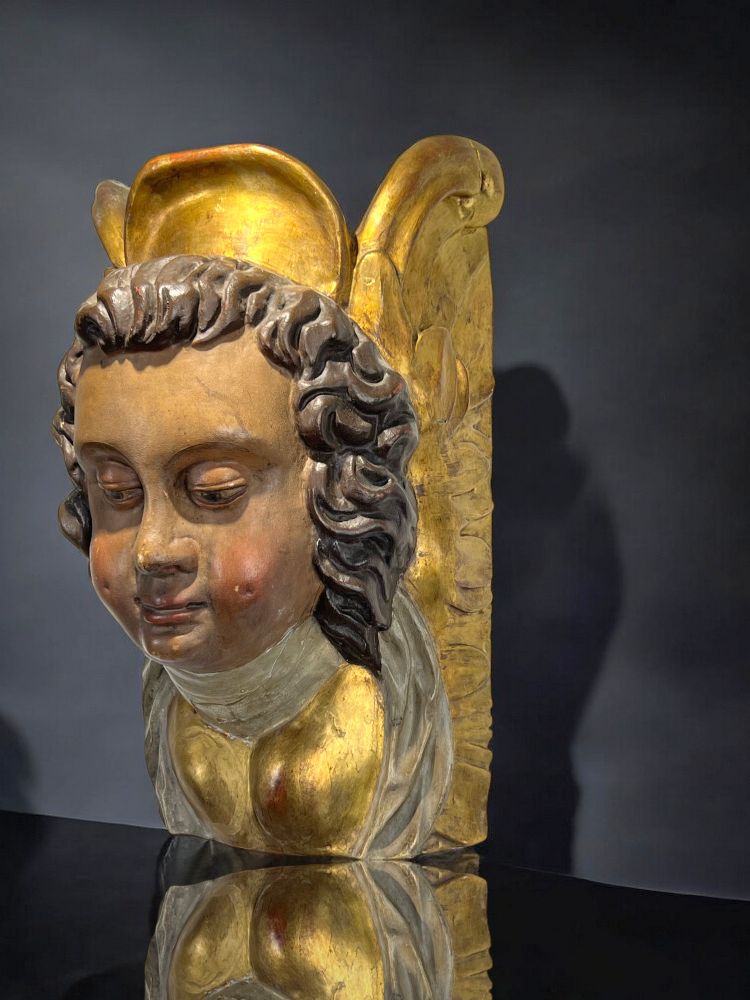 CONSOLE DA PARETE DEL XVII SECOLO CHE RAPPRESENTA UNA TESTA D'ANGELO IN LEGNO POLICROMATO