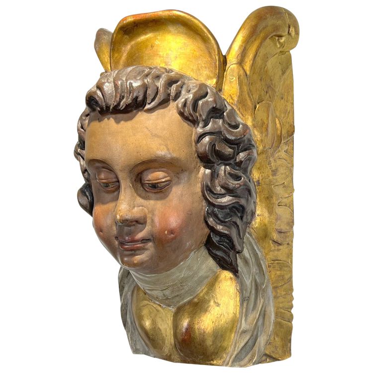 CONSOLE DA PARETE DEL XVII SECOLO CHE RAPPRESENTA UNA TESTA D'ANGELO IN LEGNO POLICROMATO