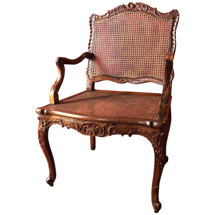 Fauteuil richement sculpté, époque Régence