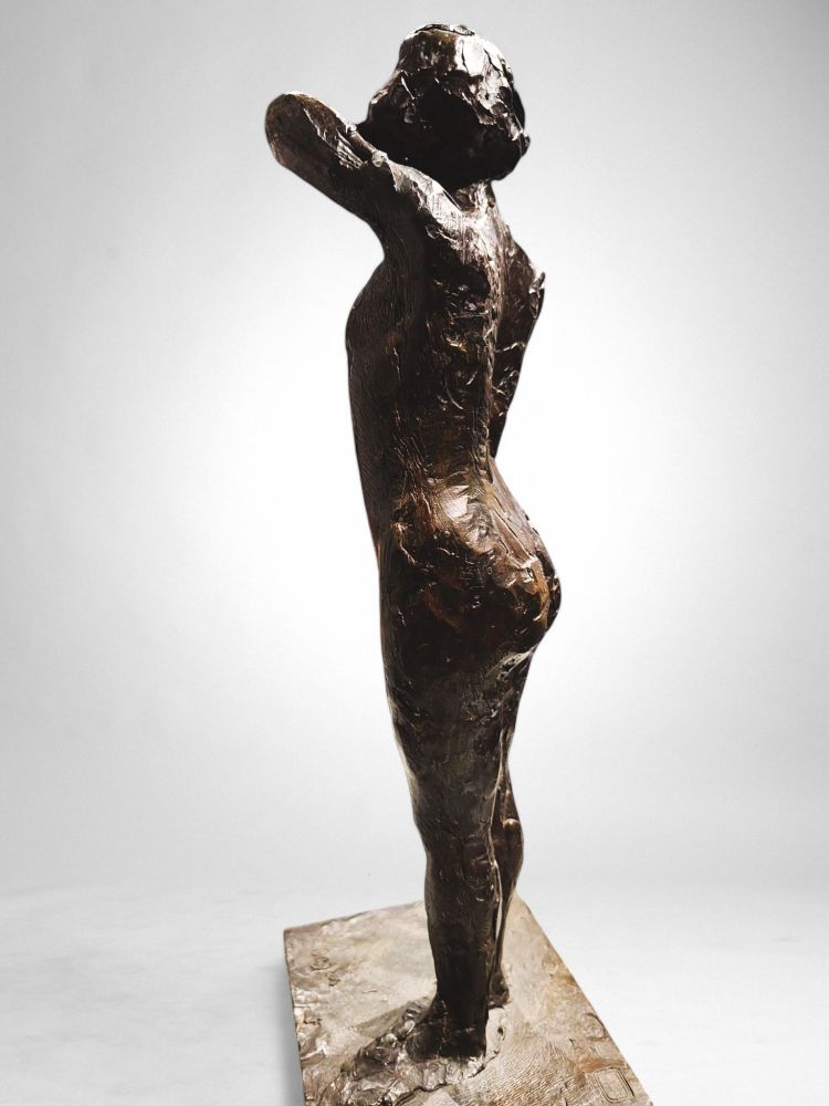 Dancer stapling the epaulette to her bodice - Edgar Degas, Valsuani cast, 1998