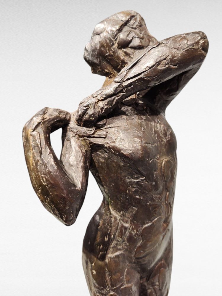 Dancer stapling the epaulette to her bodice - Edgar Degas, Valsuani cast, 1998