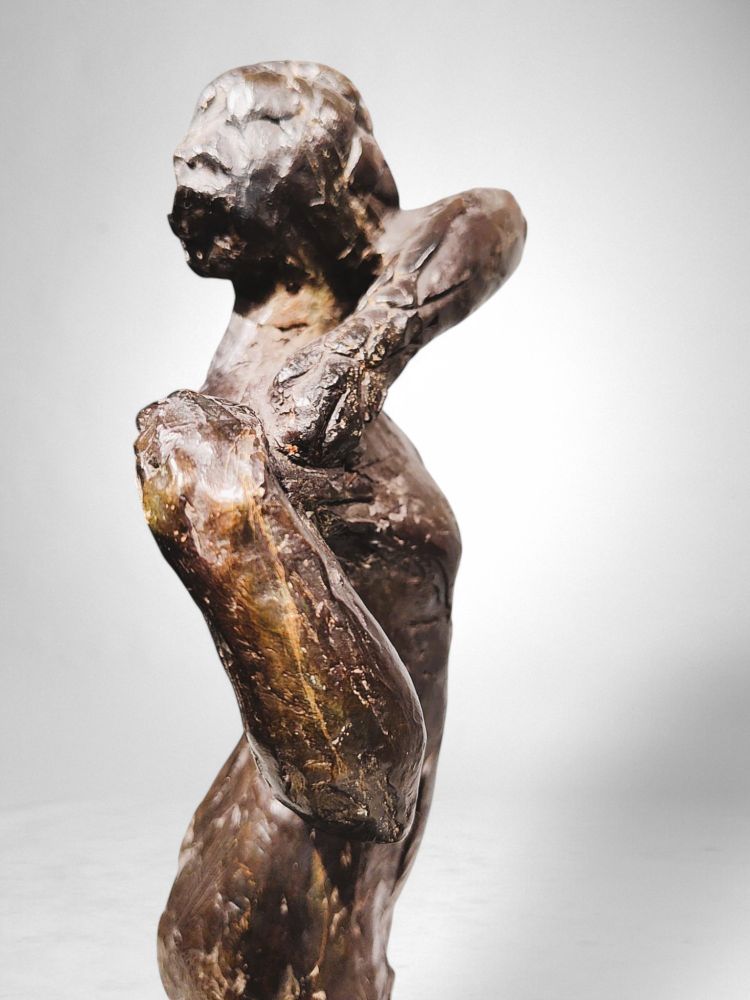 Dancer stapling the epaulette to her bodice - Edgar Degas, Valsuani cast, 1998