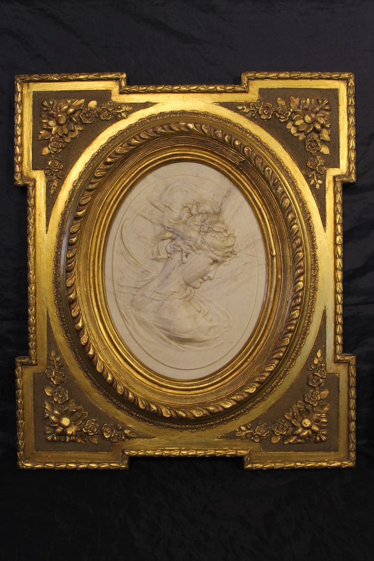 Pair of carved marble medallions with women's profiles in low relief by Louis Bottée expo 1889