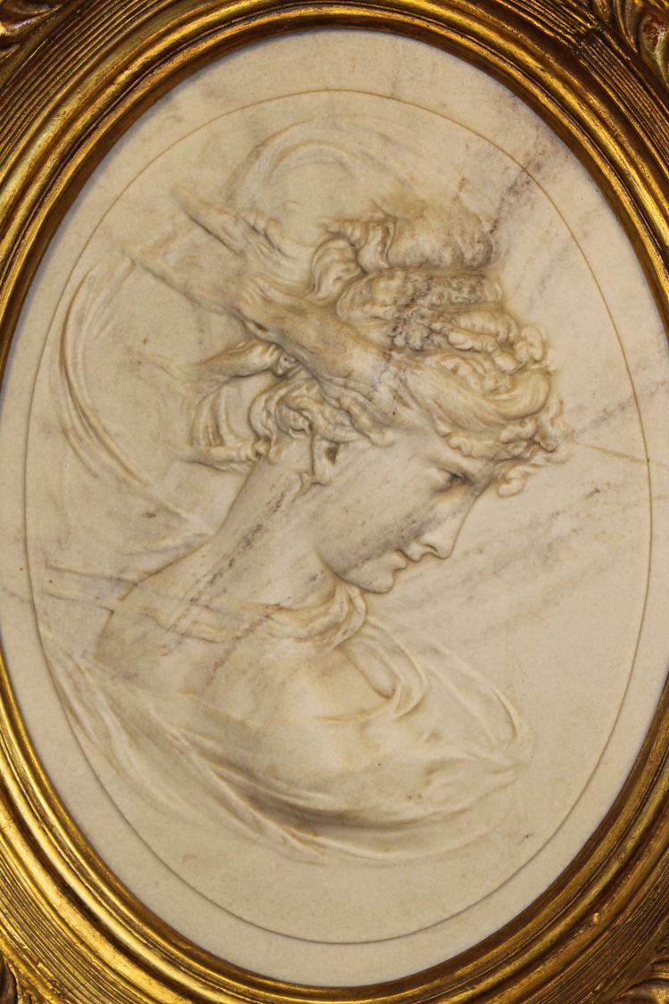 Pair of carved marble medallions with women's profiles in low relief by Louis Bottée expo 1889