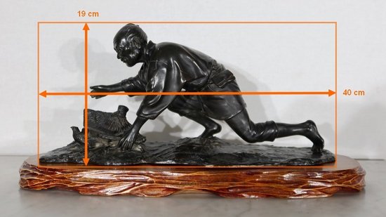  Bronzo "Il contadino che intrappola l'uccello sotto il suo cappello", Cina - Inizio XX secolo