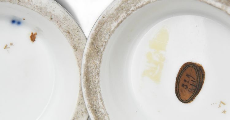 Pair of porcelain of Paris vases decorated with putti scenes