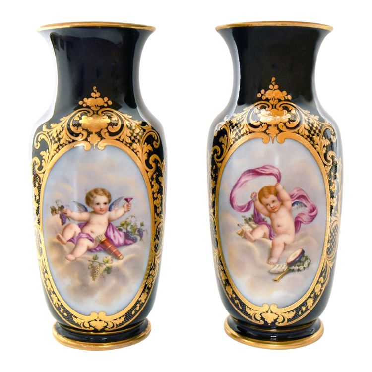 Pair of porcelain of Paris vases decorated with putti scenes