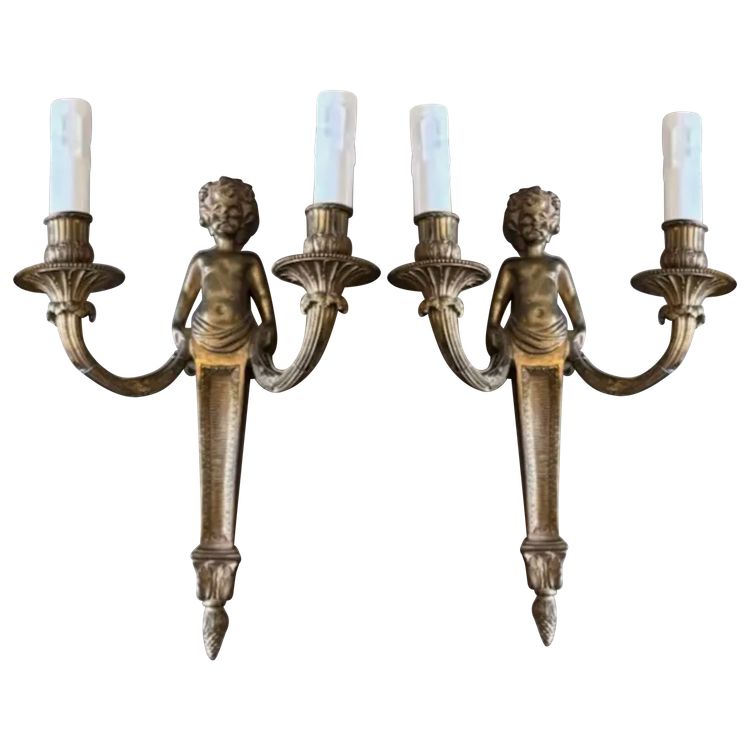 Coppia di appliques in ormolu del XIX secolo, decorate con putti