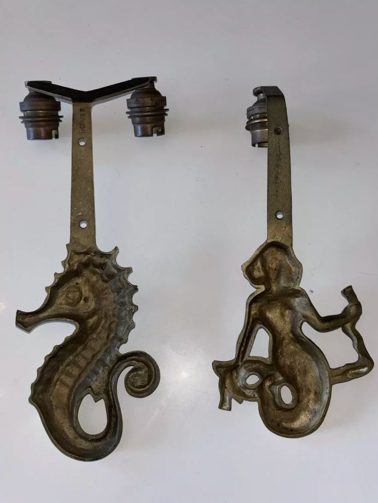 E. Guillemard (1918-1944) Two Art Deco gilded bronze wall lights Signed