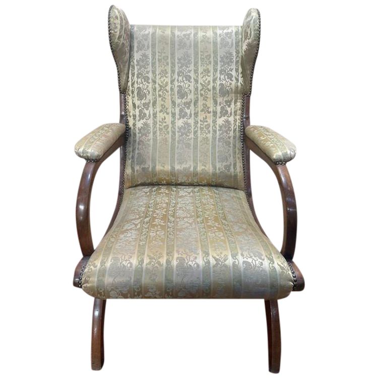 Fauteuil anglais en acajou à oreilles 