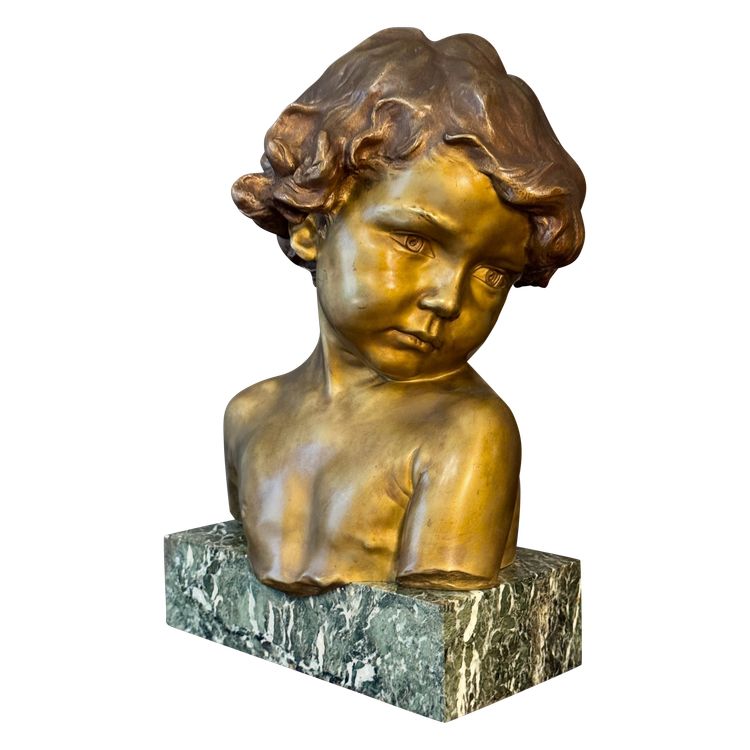 J.-M. CAMUS Large bust of a child in gilded and patinated bronze.
