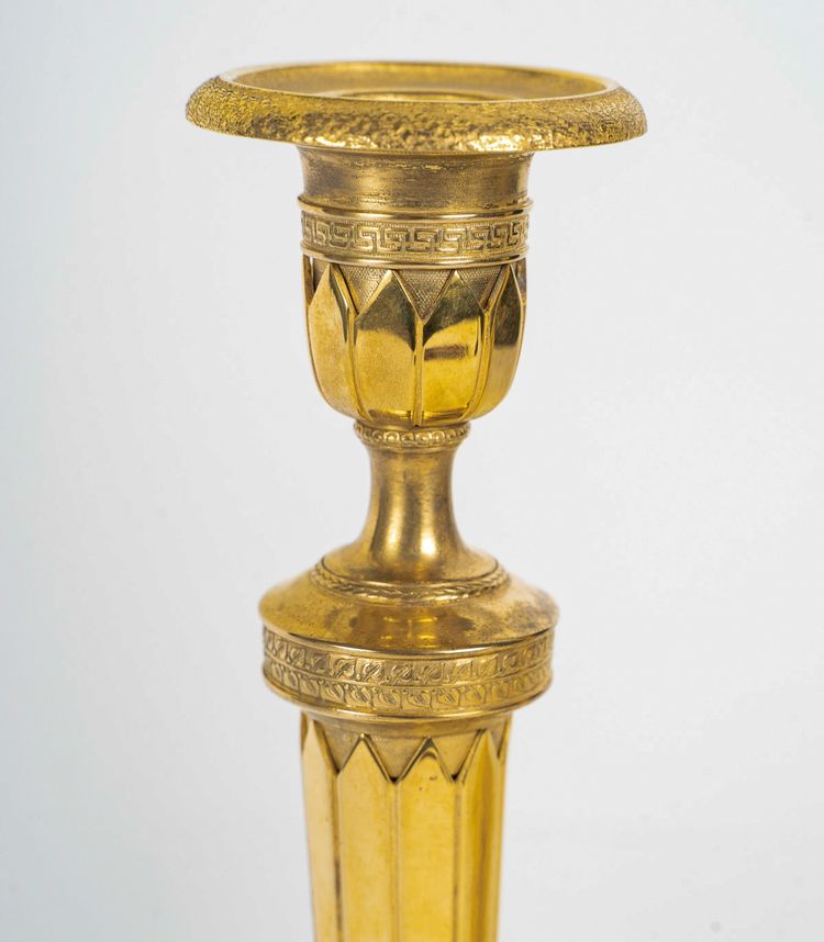 Pair of French Directoire Period Chiseled Gilt Bronze Candlesticks, Circa 1795-1799