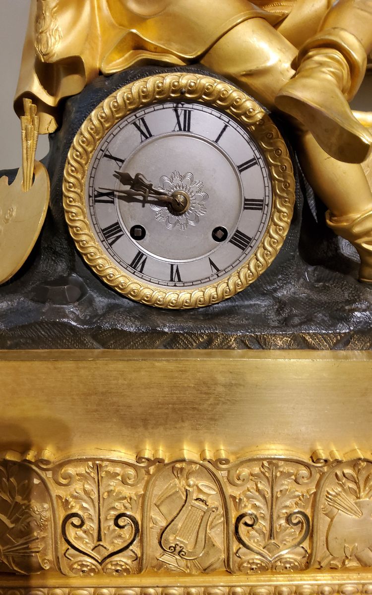 Clock with the "Painter Raphael" in gilded and patinated bronzes Restoration period 19th century