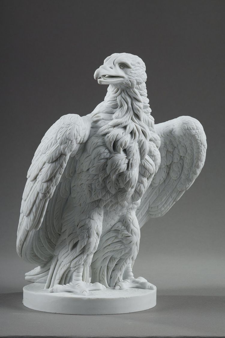 PAIR BISCUIT SCULPTURES OF NAPOLEON III EAGLES