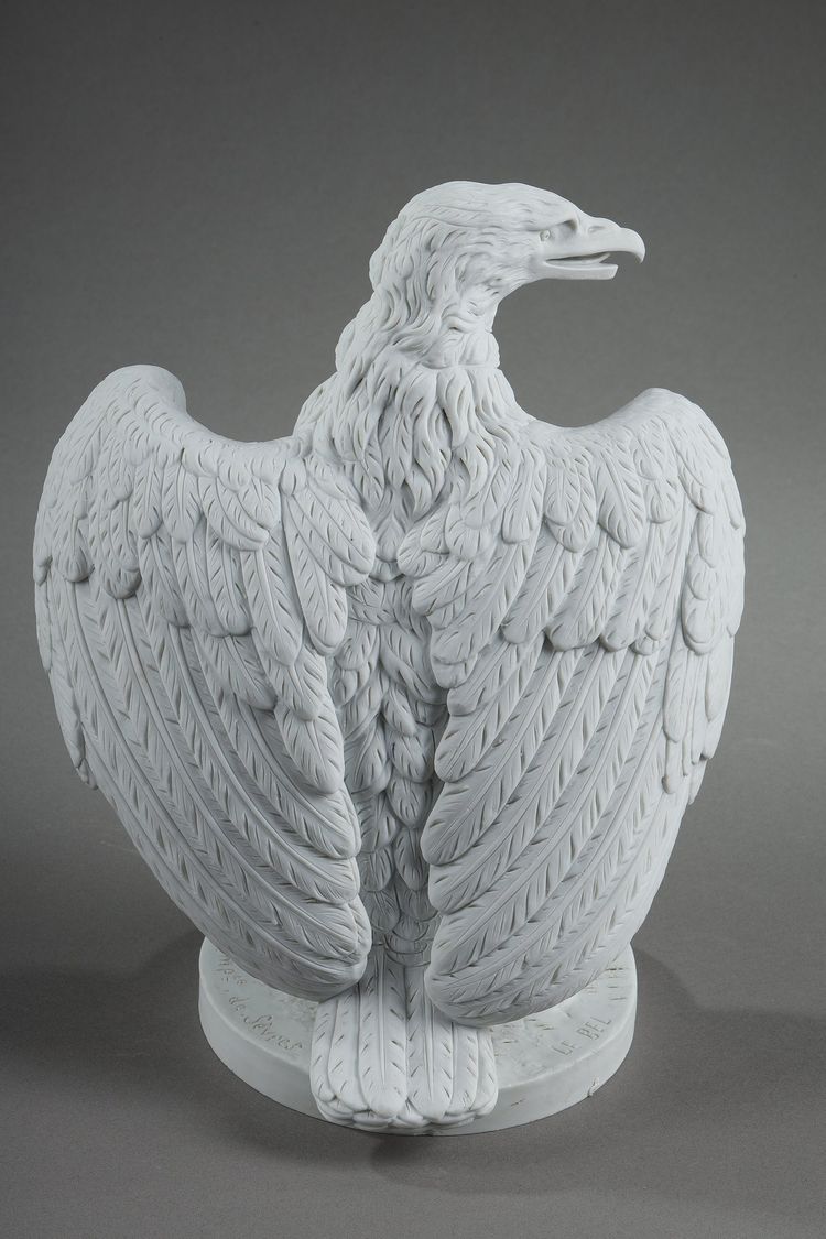 PAIR BISCUIT SCULPTURES OF NAPOLEON III EAGLES
