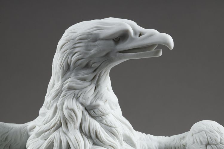 PAIR BISCUIT SCULPTURES OF NAPOLEON III EAGLES