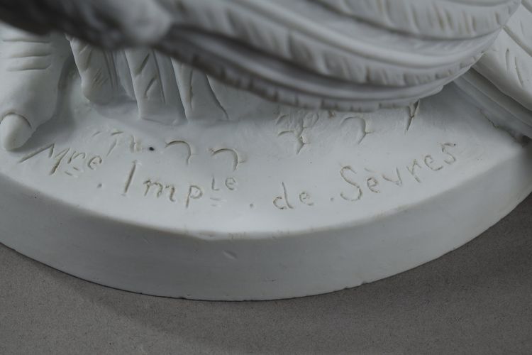 PAIR BISCUIT SCULPTURES OF NAPOLEON III EAGLES