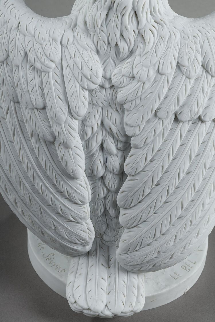PAIR BISCUIT SCULPTURES OF NAPOLEON III EAGLES