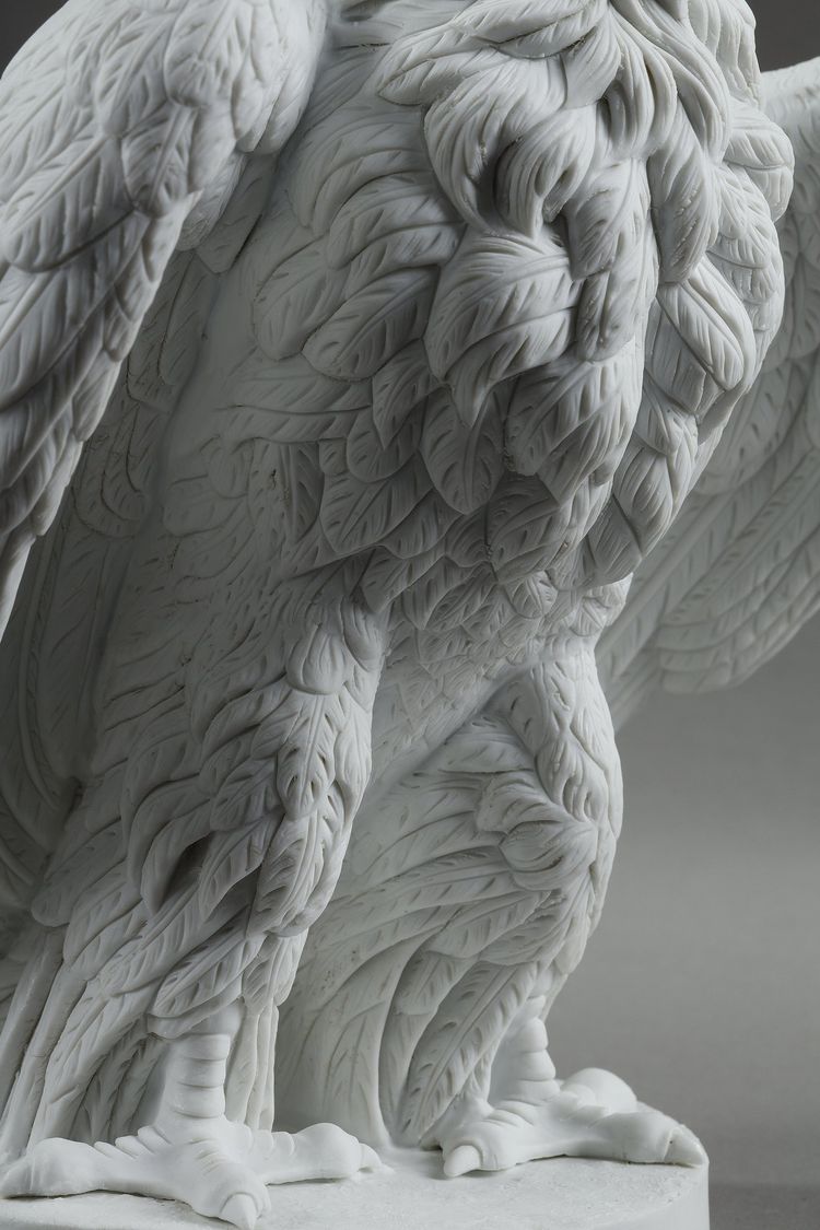 PAIR BISCUIT SCULPTURES OF NAPOLEON III EAGLES