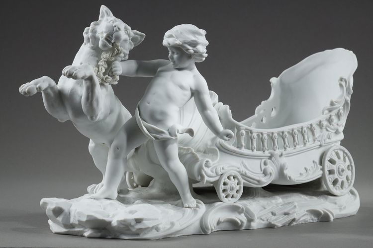 Corbeille à décor de putto et félin, manufacture Richard Eckert & Co