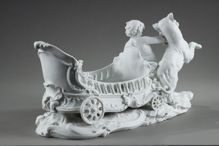 Corbeille à décor de putto et félin, manufacture Richard Eckert & Co