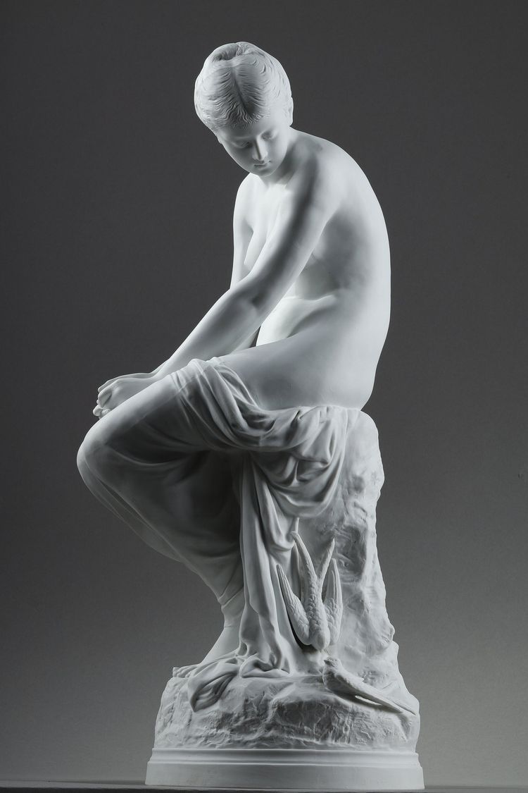 BISCUIT, "BATHER WITH SWALLOWS" BY AUGUSTE JOSEPH PEIFFER (1832 CA. 1886)