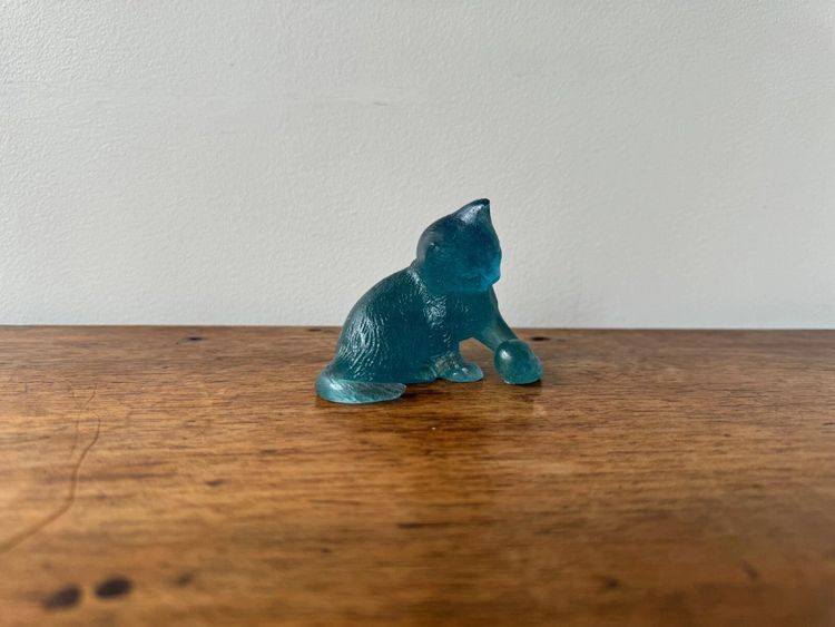 Daum France cat playing with a glass paste ball
