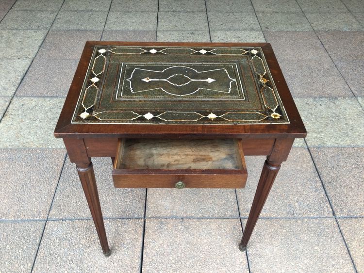 A small Louis XVI mahogany side table with an oriental-style top