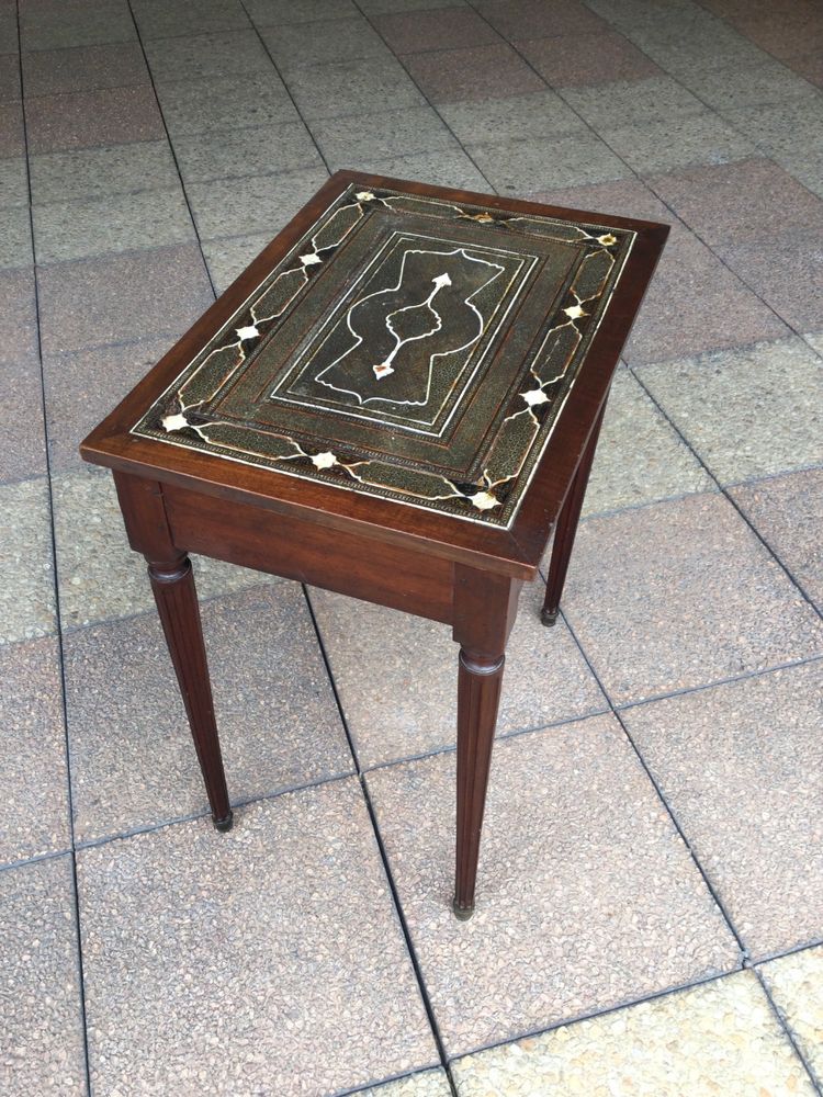 A small Louis XVI mahogany side table with an oriental-style top