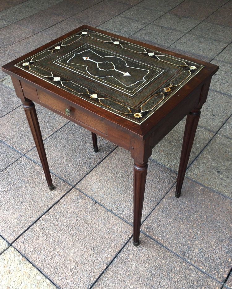 A small Louis XVI mahogany side table with an oriental-style top