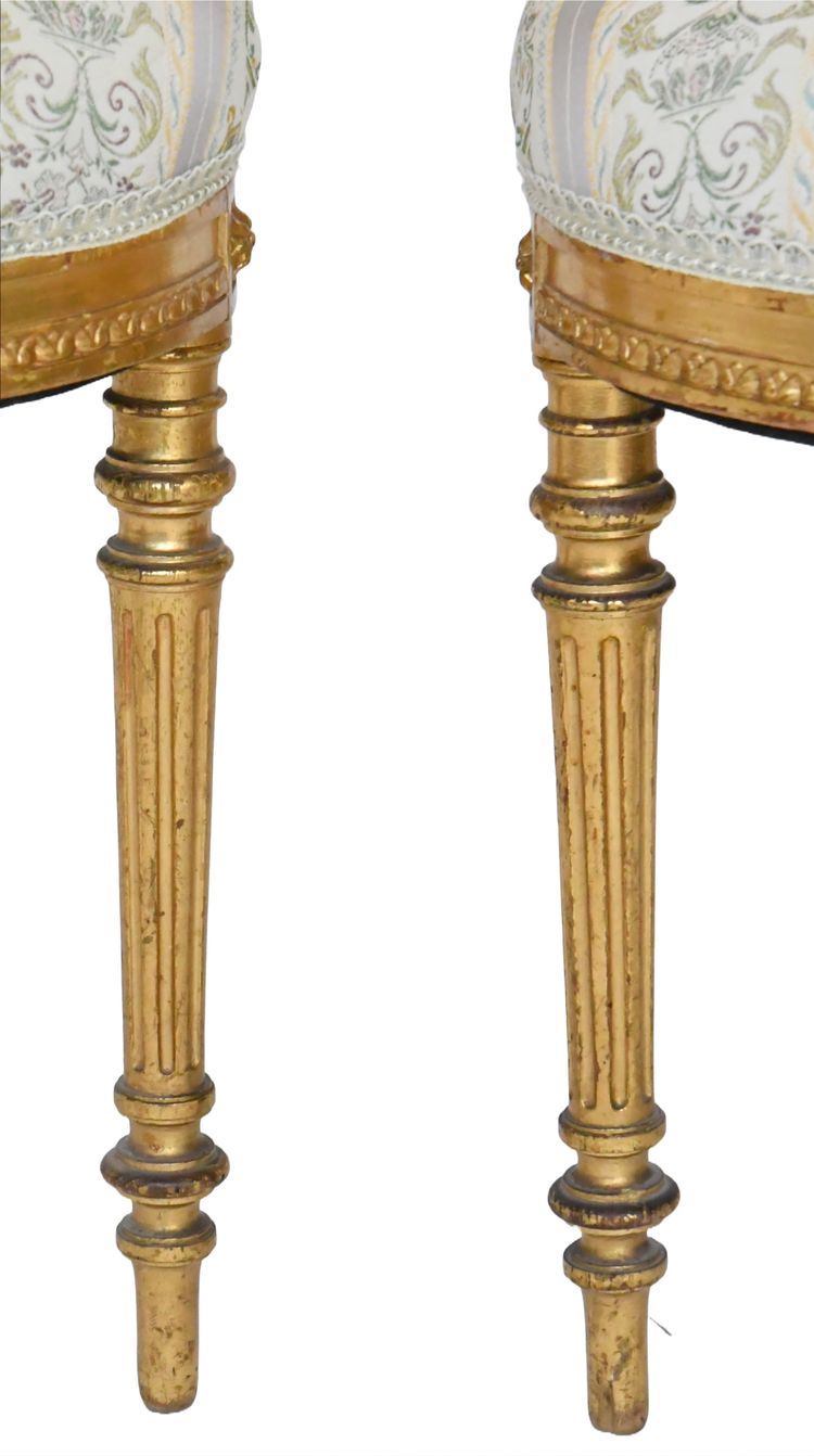 Pair of Louis XVI style chairs in gilded wood