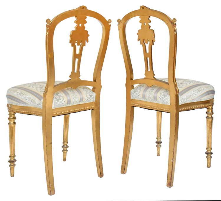 Pair of Louis XVI style chairs in gilded wood