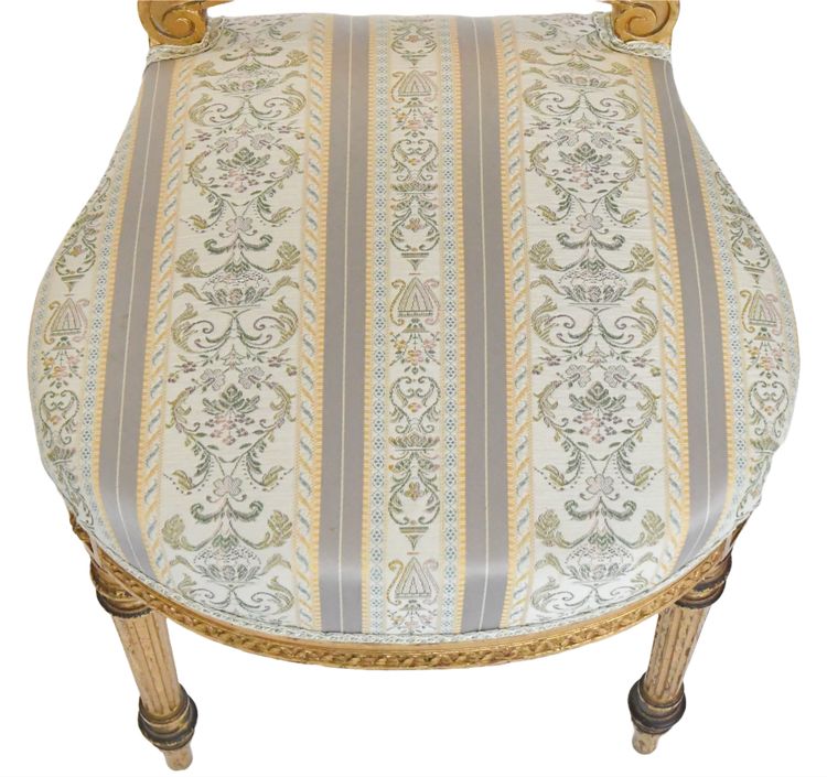 Pair of Louis XVI style chairs in gilded wood