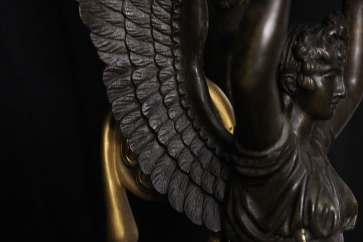 Empire wall lamp in gilded and patinated bronze with Fame, 19th century