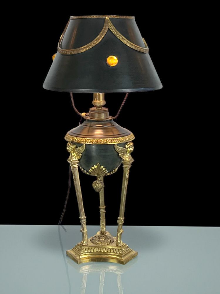 ANTIQUE EMPIRE STYLE LAMP IN BRONZE AND BRASS WITH DECORATED SHEET METAL LAMPSHADE
