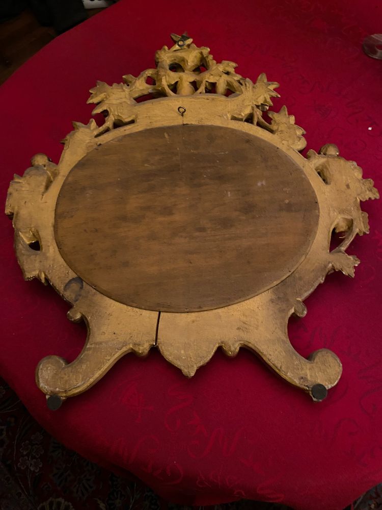Gilded mirror, oval, 18th century