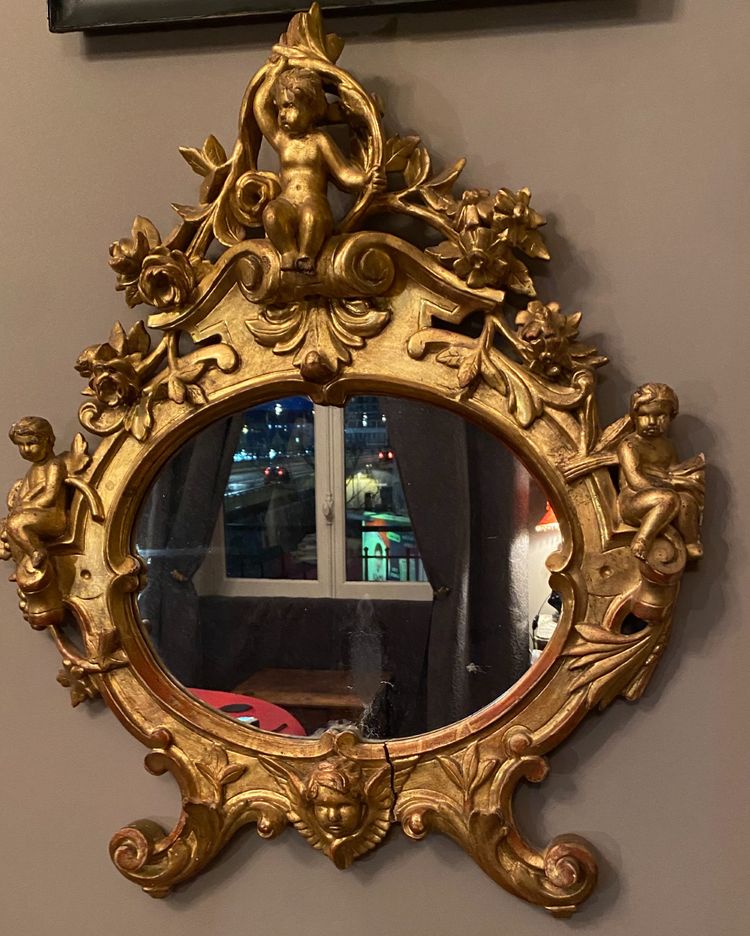 Gilded mirror, oval, 18th century