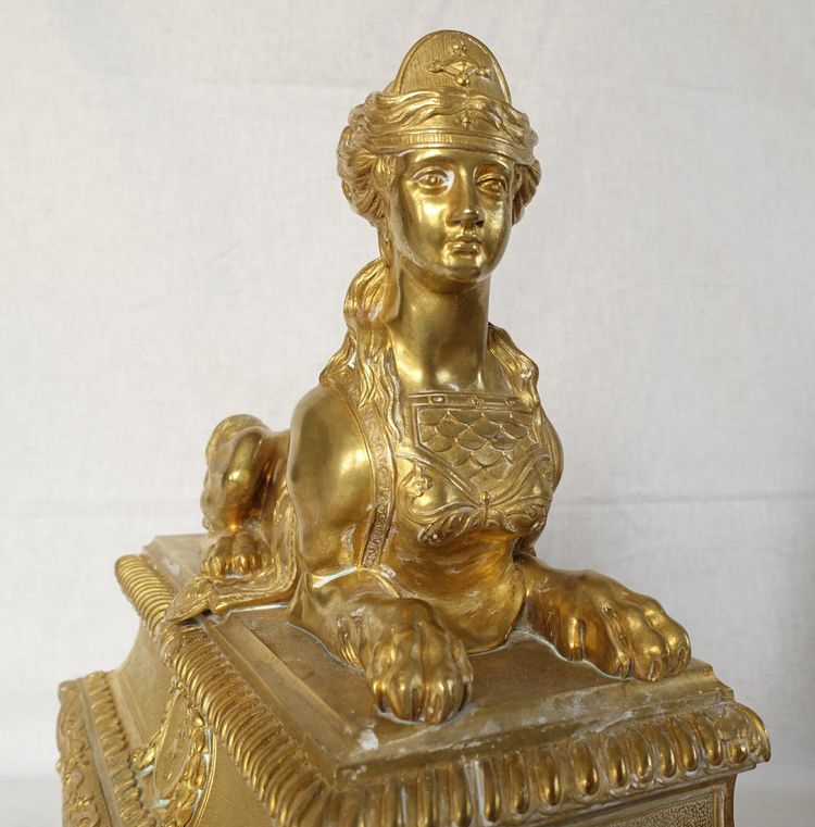 Pair of monumental andirons with Sphinxes, chiseled and gilded bronze - Regency style, Napoleon III period